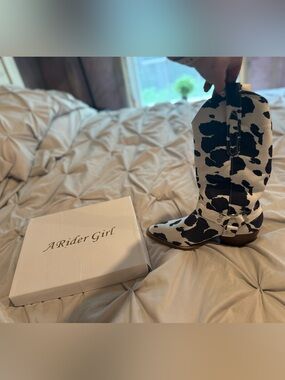 A Rider Girl Cow Print Boots - size9. (Fit more like an 8; not for wide feet).